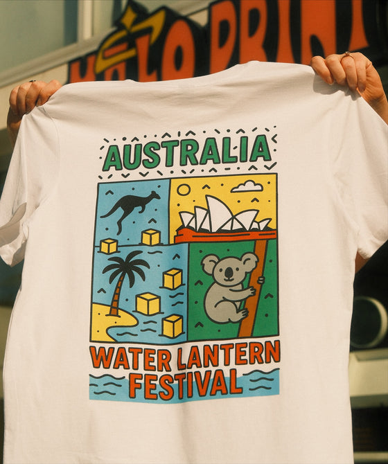 Cream t-shirt printed with an Australia Water Lantern Festival design