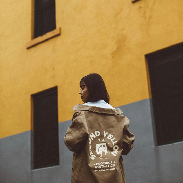 Person wearing a custom printed jacket with a large back design